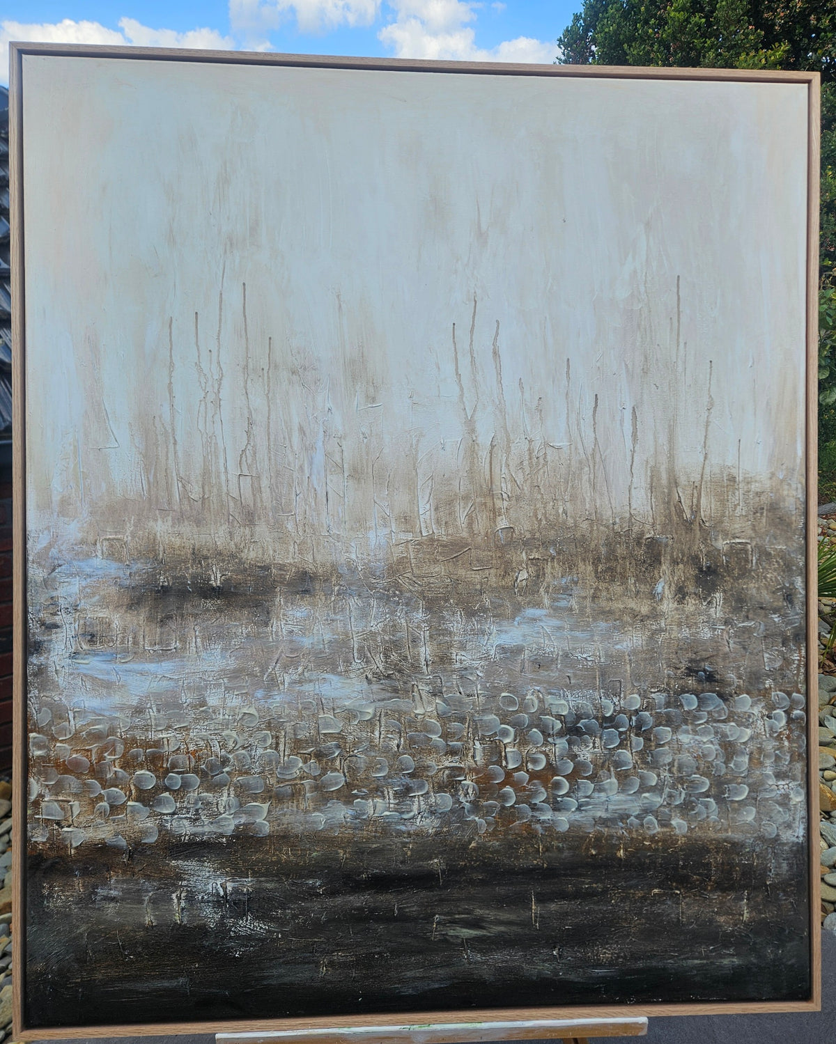 Original artwork by Art by Rafaela — muted silver, grey and brown tones with delicate bare tree forms rising from a misty landscape, textured abstract nature painting
