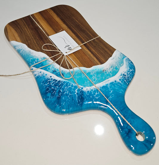 Hand-poured resin and hardwood cheese board by Art by Rafaela with turquoise ocean waves — handmade Australian coastal homewares