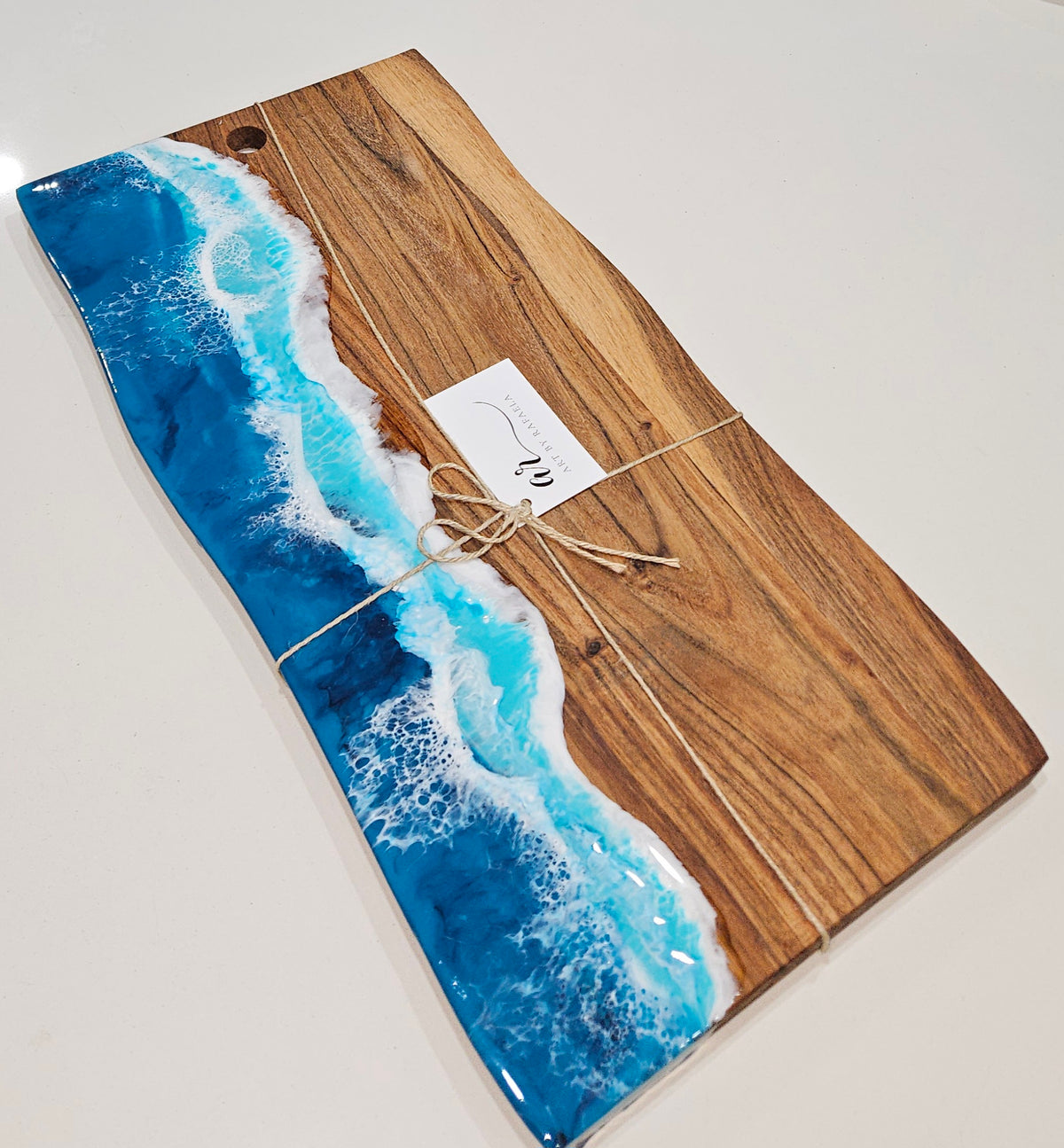 Hand-poured resin and hardwood rectangle serving platter by Art by Rafaela with turquoise and cobalt ocean waves — artisan grazing board